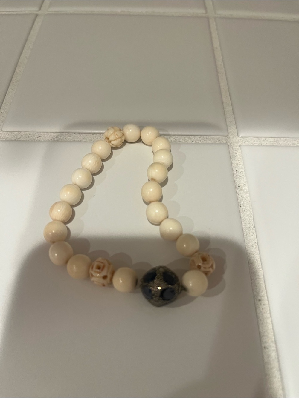 Cream Beaded Bracelet with Dark Accent Bead